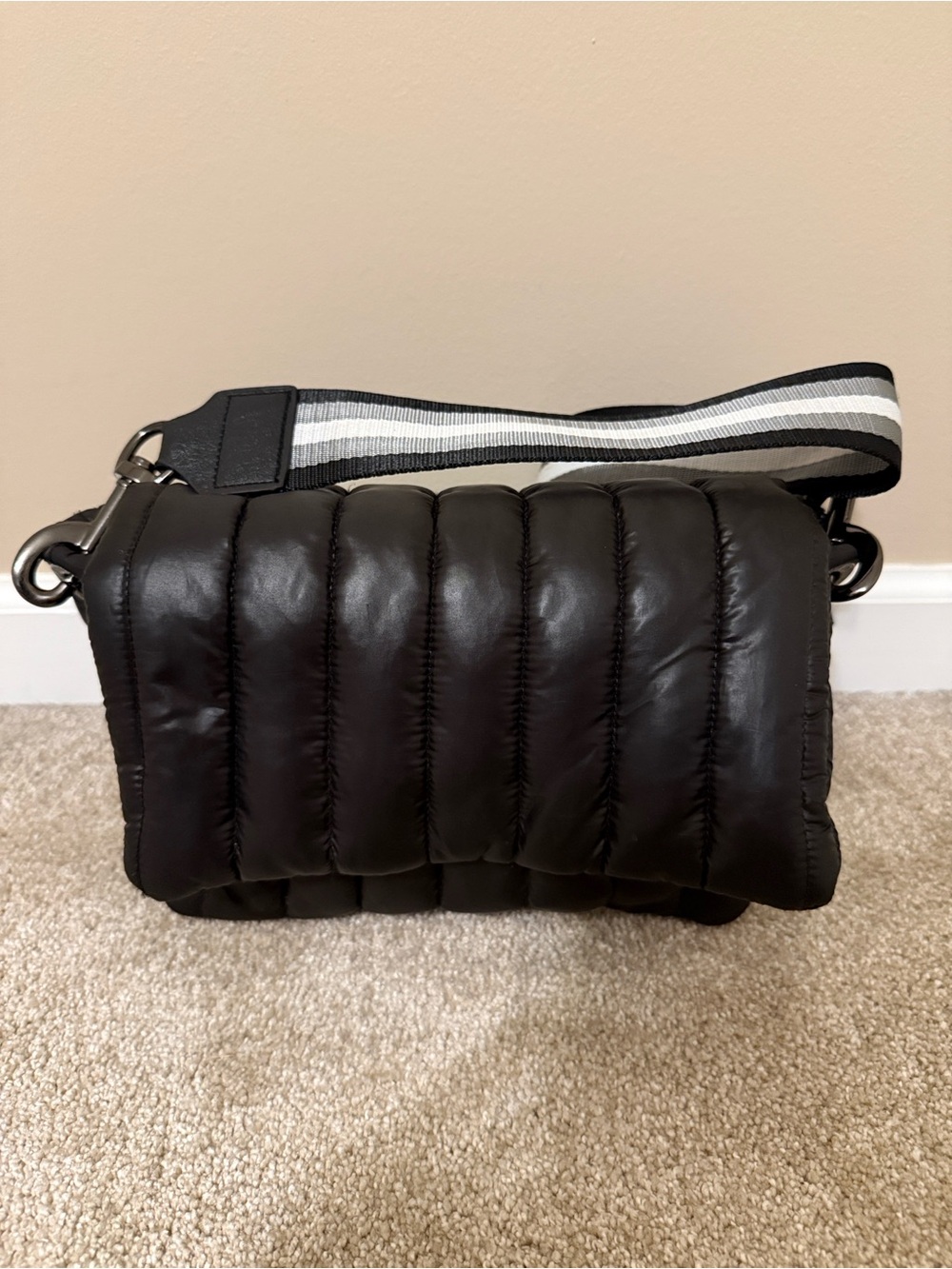 THINK ROYLN Quilted Black Crossbody Bag with Striped Strap